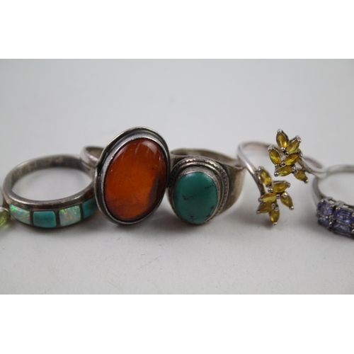 2151 - Eight silver gemstone set rings to include peridot, opal, tanzanite etc. - approx. gross weight 35g