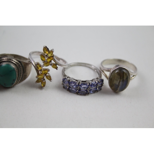 2151 - Eight silver gemstone set rings to include peridot, opal, tanzanite etc. - approx. gross weight 35g