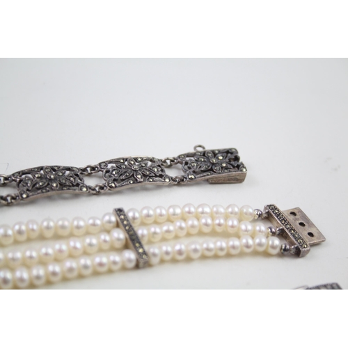 2157 - Three silver and marcasite set bracelets - approx. gross weight 74g