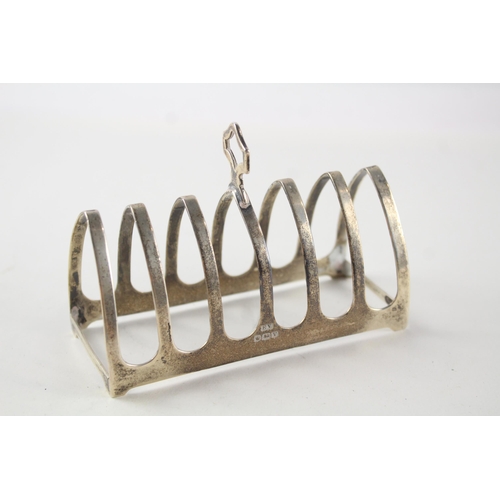 2197 - A Viners Ltd. hallmarked Sheffield sterling silver seven bar toast rack, dated 1938 - approx. gross ... 