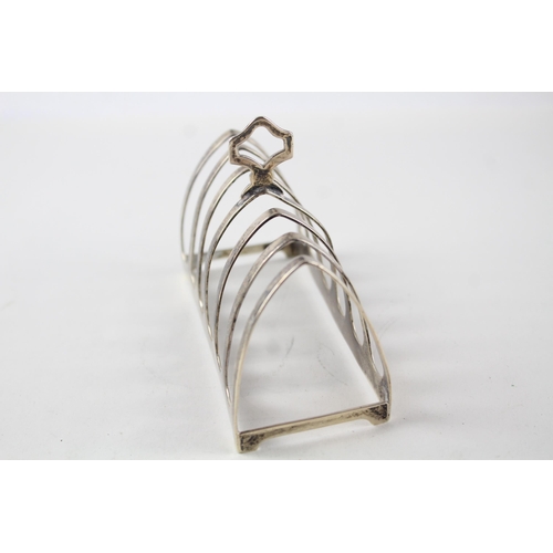 2197 - A Viners Ltd. hallmarked Sheffield sterling silver seven bar toast rack, dated 1938 - approx. gross ... 