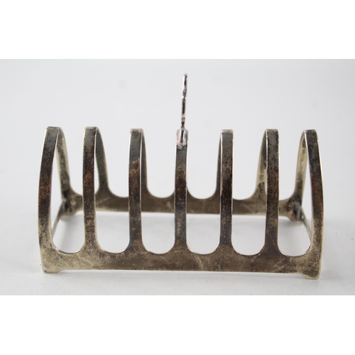 2197 - A Viners Ltd. hallmarked Sheffield sterling silver seven bar toast rack, dated 1938 - approx. gross ... 