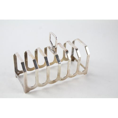 2198 - A William Suckling Ltd hallmarked Birmingham sterling silver seven bar toast rack - approx. gross we... 