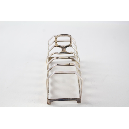 2198 - A William Suckling Ltd hallmarked Birmingham sterling silver seven bar toast rack - approx. gross we... 