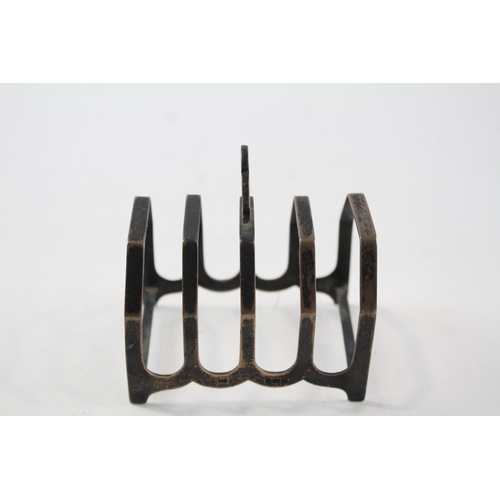 2199 - A Thomas Bishton hallmarked Birmingham sterling silver five bar toast rack - approx. gross weight 54... 