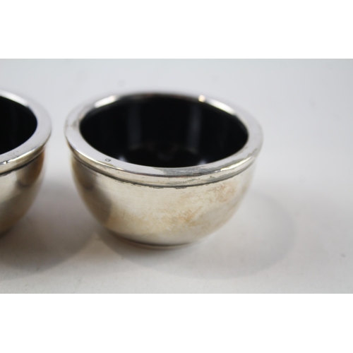 2200 - Two Joseph Gloster Ltd. hallmarked Birmingham sterling silver salt dishes - approx. gross weight 55g