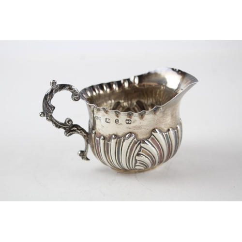 2205 - A Victorian Henry Matthews hallmarked Birmingham sterling silver cream jug - approx. gross weight 43... 