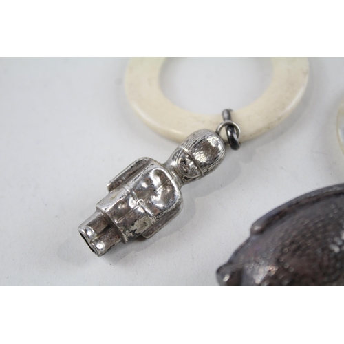 2208 - Two hallmarked .925 sterling silver baby rattles, one penguin hallmarked Birmingham 1939 and one gua... 