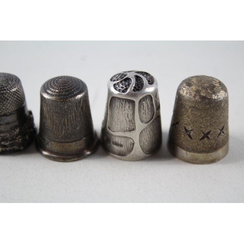 2230 - Four .925 sterling silver thimbles - approx. gross weight 32g