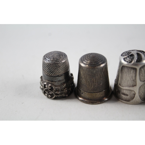 2230 - Four .925 sterling silver thimbles - approx. gross weight 32g