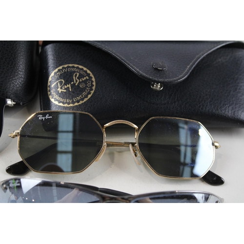 2314 - Four pairs of cased Ray-Ban sunglasses