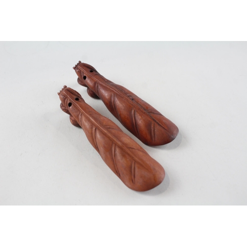 2338 - Two Oriental carved wooden zodiac snake tea/coffee scoops signed to base