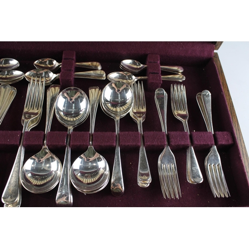 457 - A Viners 102 piece stainless steel and ivorine canteen of cutlery