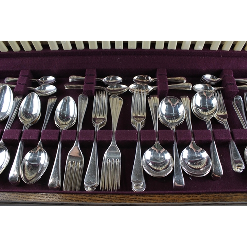 457 - A Viners 102 piece stainless steel and ivorine canteen of cutlery