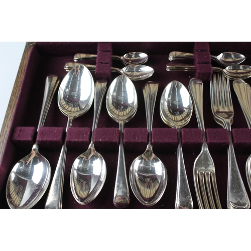 457 - A Viners 102 piece stainless steel and ivorine canteen of cutlery