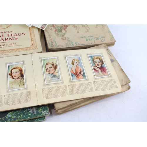 564 - A collection of cigarette cards to include Chix, Wills, Players etc.