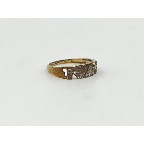 2003 - A 9ct gold diamond 'Mum' ring, size O - approx. gross weight 1.5g