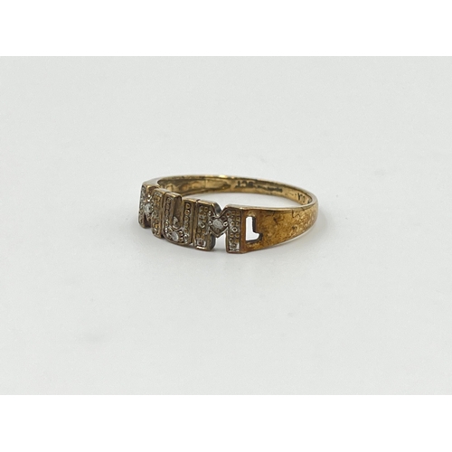 2003 - A 9ct gold diamond 'Mum' ring, size O - approx. gross weight 1.5g