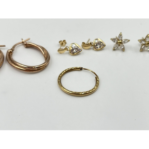 2004 - Three pairs of earrings, one .925 gilt silver, one 9ct gold CZ heart shaped and one yellow metal CZ ... 