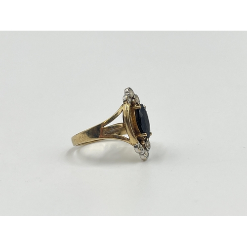 2006 - A hallmarked 9ct gold sapphire and CZ dress ring, size J½ - approx. gross weight 2.6g