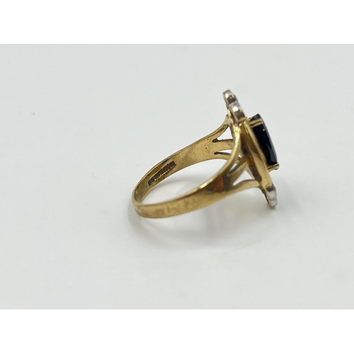 2006 - A hallmarked 9ct gold sapphire and CZ dress ring, size J½ - approx. gross weight 2.6g