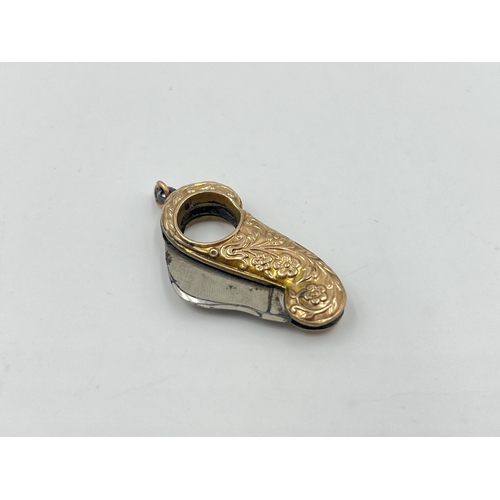 2007 - A 9ct gold handled folding pendant knife - approx. gross weight 8.8g and 5cm long