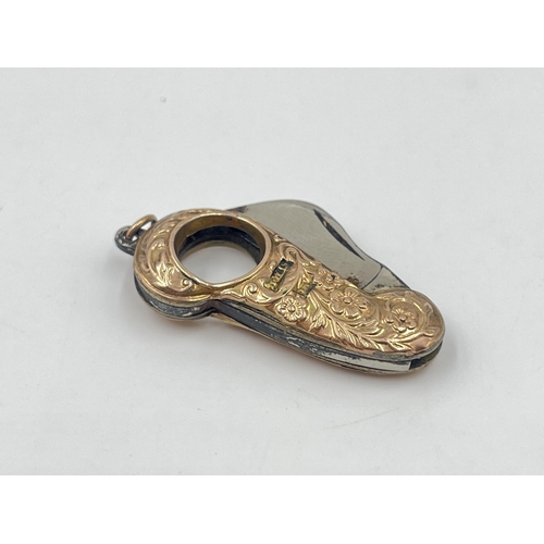 2007 - A 9ct gold handled folding pendant knife - approx. gross weight 8.8g and 5cm long