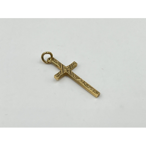 2009 - A hallmarked Birmingham 9ct gold cross pendant - approx. gross weight 1.15g