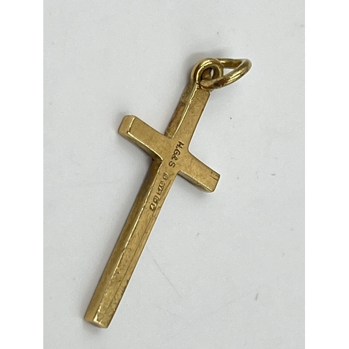 2009 - A hallmarked Birmingham 9ct gold cross pendant - approx. gross weight 1.15g