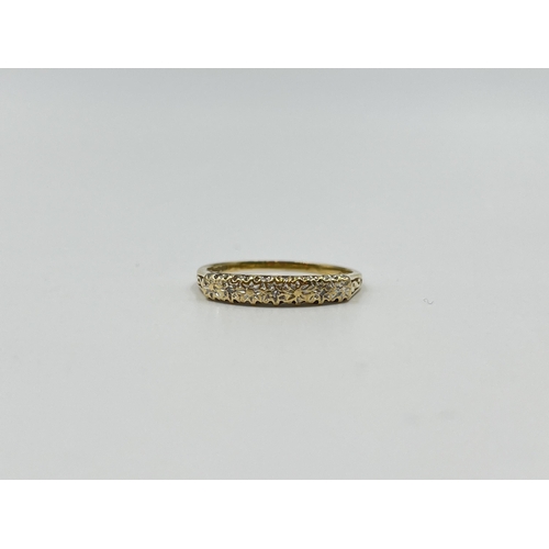 2010 - A 9ct gold diamond ring, size M - approx. gross weight 1.5g