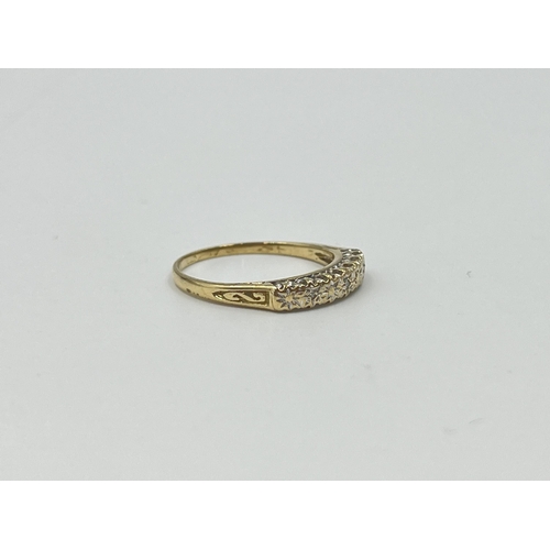 2010 - A 9ct gold diamond ring, size M - approx. gross weight 1.5g