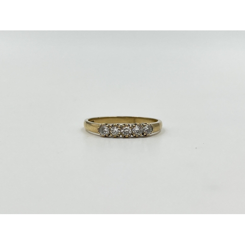 2012 - A hallmarked Birmingham 9ct gold CZ five stone ring, size N½ - approx. gross weight 1.44g