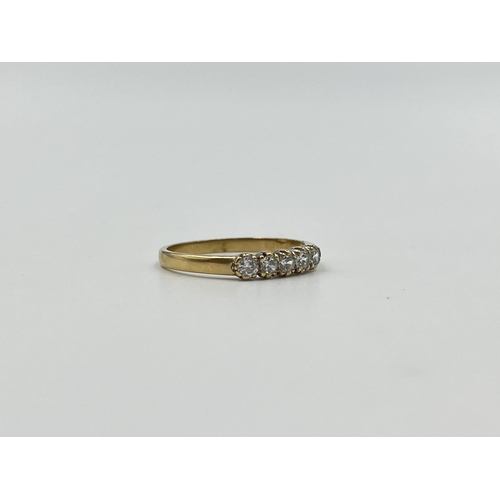 2012 - A hallmarked Birmingham 9ct gold CZ five stone ring, size N½ - approx. gross weight 1.44g