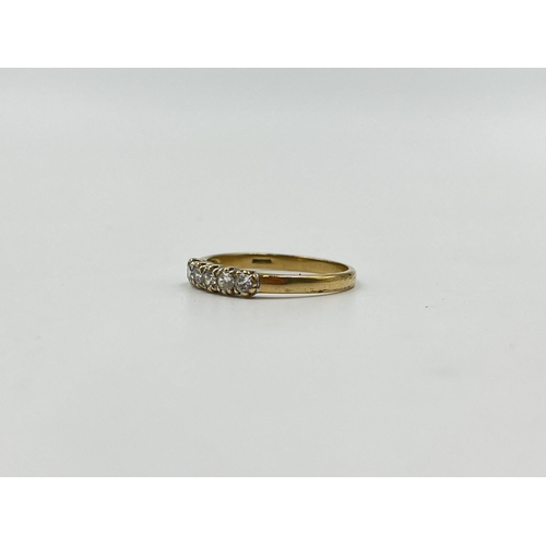 2012 - A hallmarked Birmingham 9ct gold CZ five stone ring, size N½ - approx. gross weight 1.44g