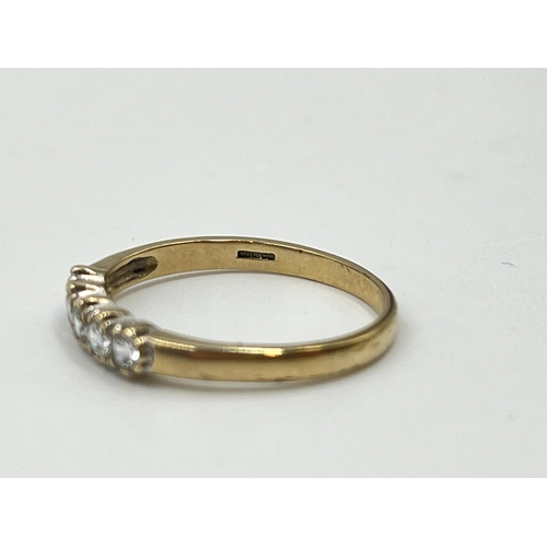 2012 - A hallmarked Birmingham 9ct gold CZ five stone ring, size N½ - approx. gross weight 1.44g