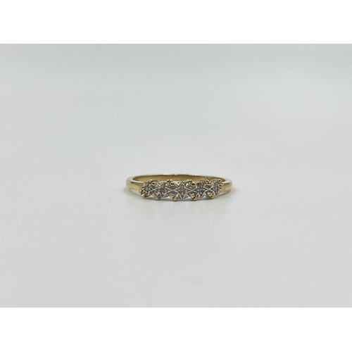 2013 - A hallmarked London 9ct gold diamond five stone ring, size M - approx. gross weight 1.15g