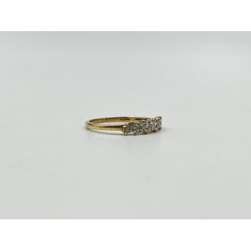 2013 - A hallmarked London 9ct gold diamond five stone ring, size M - approx. gross weight 1.15g