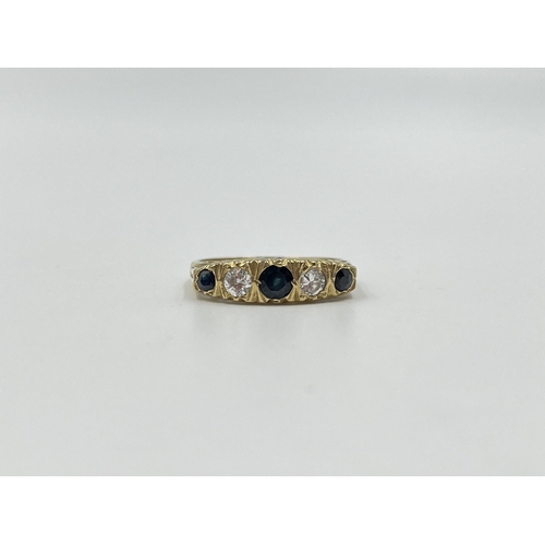 2014 - A hallmarked Sheffield 9ct gold sapphire and CZ ring, size P - approx. gross weight 2.3g