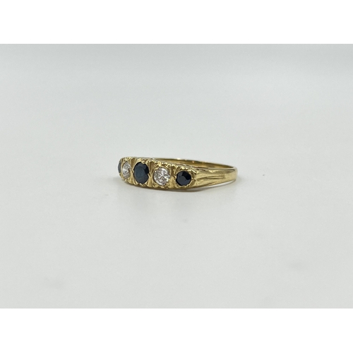 2014 - A hallmarked Sheffield 9ct gold sapphire and CZ ring, size P - approx. gross weight 2.3g