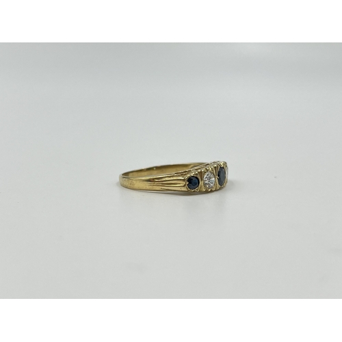 2014 - A hallmarked Sheffield 9ct gold sapphire and CZ ring, size P - approx. gross weight 2.3g