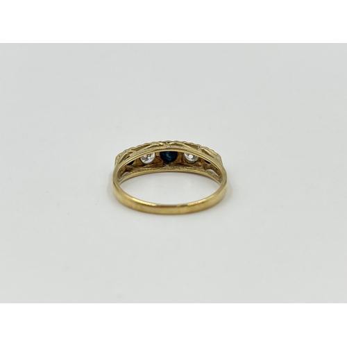 2014 - A hallmarked Sheffield 9ct gold sapphire and CZ ring, size P - approx. gross weight 2.3g