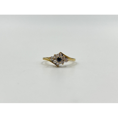 2015 - A hallmarked London 9ct gold sapphire and CZ twist setting ring, size J½ - approx. gross weight 1.44... 