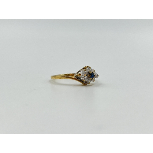 2015 - A hallmarked London 9ct gold sapphire and CZ twist setting ring, size J½ - approx. gross weight 1.44... 