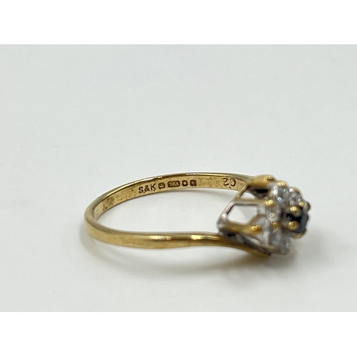 2015 - A hallmarked London 9ct gold sapphire and CZ twist setting ring, size J½ - approx. gross weight 1.44... 