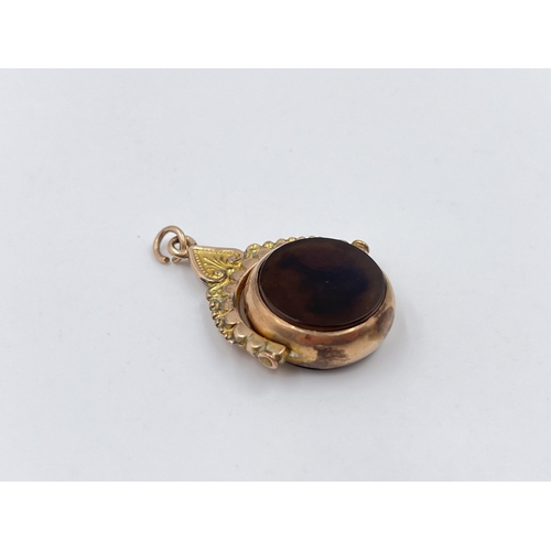 2017 - An early 20th century 9ct gold bloodstone and agate swivel fob/pendant - approx. gross weight 6g