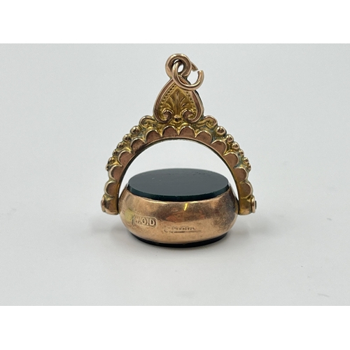 2017 - An early 20th century 9ct gold bloodstone and agate swivel fob/pendant - approx. gross weight 6g