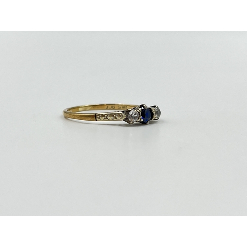 2019 - A 9ct gold sapphire and clear gemstone ring, size P - approx. gross weight 1.58g