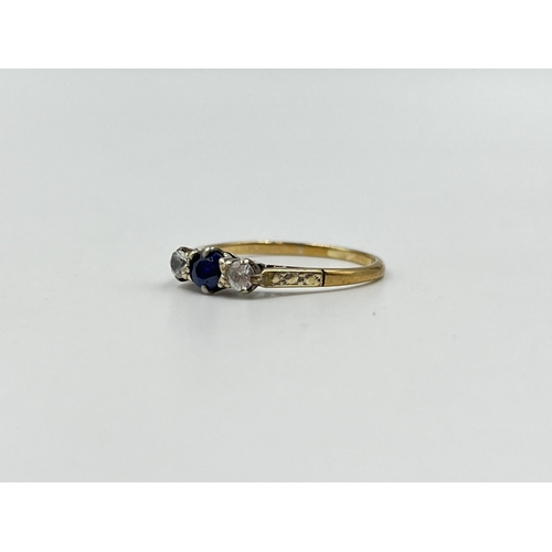 2019 - A 9ct gold sapphire and clear gemstone ring, size P - approx. gross weight 1.58g