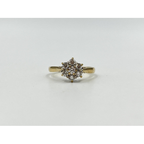 2021 - A hallmarked Birmingham 9ct gold CZ floral cluster ring, size Q - approx. gross weight 2.7g