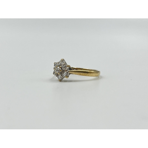 2021 - A hallmarked Birmingham 9ct gold CZ floral cluster ring, size Q - approx. gross weight 2.7g